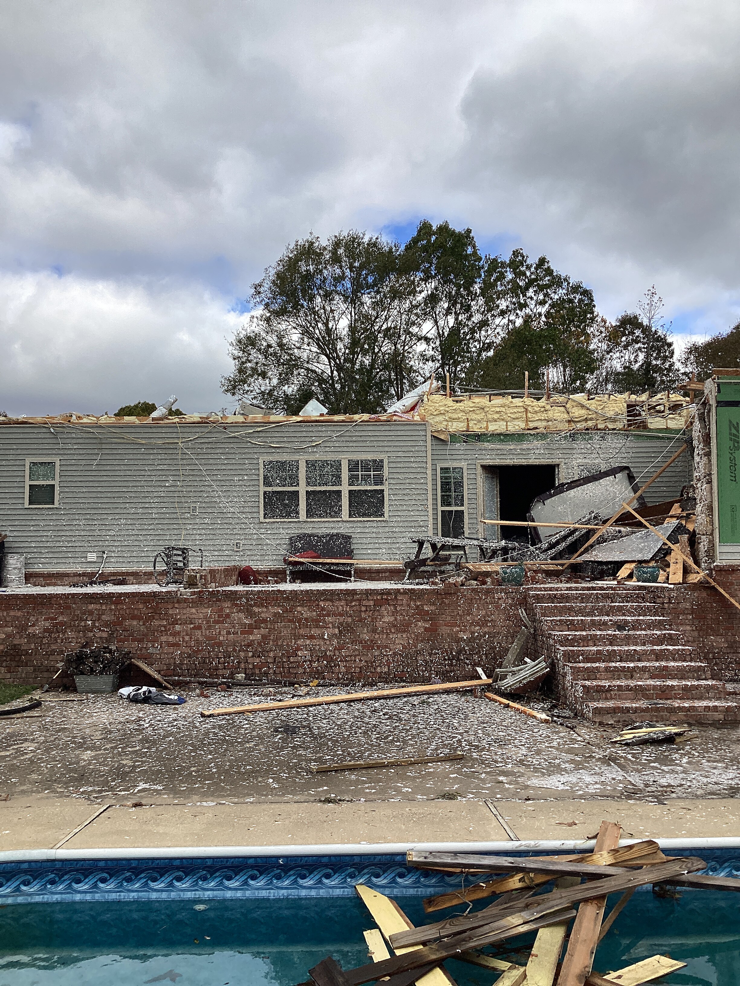 Low-end EF2 damage to a home near Sardis, Arkansas.