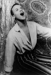 Portrait of Harry Belafonte, singing.