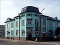 Inn in an older building at the corner of a street