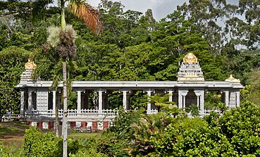 On left is a gopuram, to the right above the sanctum is vimana