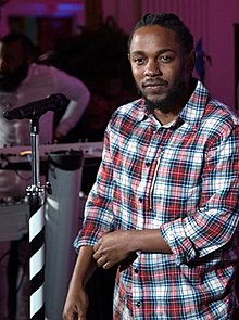 Kendrick Lamar looking towards the camera