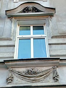 Adorned window before refurbishment