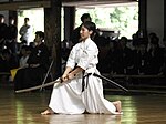 Japanese girl practicing Iaido with a custom made katana.