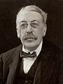 Charles Villiers Stanford, Irish composer.