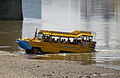 Image 18Duck tour converted DUKW amphibious vehicle exiting the River Thames.