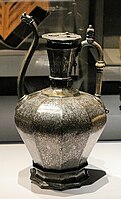 Homberg ewer, by Ahmad al-Dhaki al-Mawsili. Inlaid Brass with Christian Iconography. probably Mosul, dated 1242–43.[38]