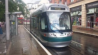 The tram stop looking north, towards the curve into Victoria Street