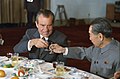 President Nixon and Chinese Premier Zhou Enlai toast one another during the former's visit to the People's Republic of China. The two are credited with forging a new axis in the Cold War out of mutual hostility to the Soviet Union.