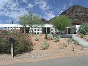The White Gates Residence was built in 1964 and is located in 5202 Saddle Road in the corner of White Gates Drive in the southern end of Camelback Mountain. In 2009 it was listed in the Arizona Preservation Foundation Historic Properties Endangered list. The property is listed as Historic by the Phoenix Historic Property Register.