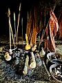 Spears, calabashes, and bark cloth at Kiwumulo Cave