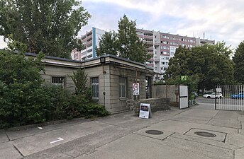 Low-rise building on property, north corner