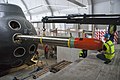 Torpedo 613 being loaded into HSwMS Neptun Inside the museum on 31 July 2013.