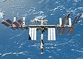 The newly upgraded International Space Station seen from the shuttle after undocking.