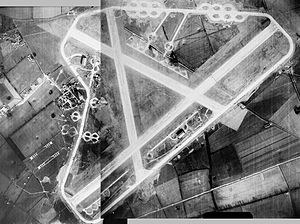 A 1946 aerial photograph of RAF Sculthorpe, the main runway runs diagonally with the technical and bomb dump on the left.