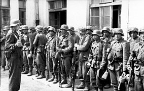 Well-armed soldiers of the "Dönmec" battlaion, an Azerbaijani SS volunteer formation during the Warsaw Uprising