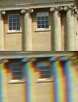 Chromatic aberration from inadequate correction to converge different wavelengths, giving a "rainbow effect" at high-contrast edges.