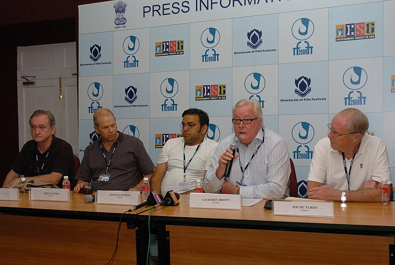 Geoffrey_Brown%2C_Mr._Jim_Mc_Elroy%2C_Mr._John_Winter_and_Mr._Anupam_Sharma_addressing_the_Press_Conference%2C_during_the_39th_International_Film_Festival_%28IFFI-2008%29%2C_in_Panaji%2C_Goa_on_November_25%2C_2008.jpg