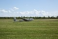 A sail plane landing on the air-fields.