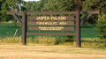 These large wooden signs at SR 143 & US Hwy 421 were taken down in the spring of 2020.