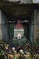 A jizo figure inside the small shrine at Inohana-oji.