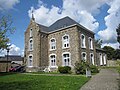 Ancienne école communale datée de 1877.