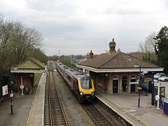 A northbound CrossCountry service speeds through Mortimer