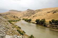 A river flowing through a wide valley