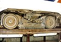 The truck of a SEPTA PCC streetcar showing the track brake magnet array between the wheels.