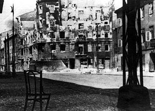 Stroop Collection, not in the report. Zamenhofa Street looking North at resistance in Gęsia 20 building.