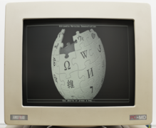 Wikipedia logo displayed on a CRT monitor by a Hercules-compatible video card