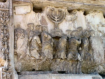 Titus' triumphal procession depicted on the Arch of Titus, showing the loot captured from Jerusalem in 81 AD