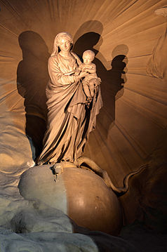 Statue of Mary by Pigalle at Saint-Sulpice. The stucco decoration is by Mouchy