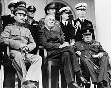 Tehran, Iran, Dec. 1943—Front row: Marshal Stalin, President Roosevelt, Prime Minister Churchill on the portico of the Soviet Embassy—Back row: General H.H. Arnold, Chief of the U.S. Army Air Force; General Alan Brooke, Chief of the Imperial General Staff; Admiral Cunningham, First Sea Lord; Admiral William Leahy, Chief of staff to President Roosevelt, during the Tehran Conference