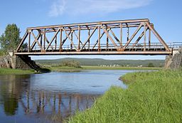 Puostijoki (Armasjoki) vid mynningen i Torne älv i Niemis. Finland i bakgrunden.