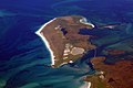 Image 35Aerial view of the low-lying island of Berneray in the Outer Hebrides, known for its sandy beaches backed by machair Credit: Doc Searls