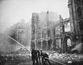 Image 24Firefighters putting out flames after an air raid during The Blitz, 1941 (from History of London)