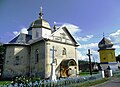 Church of St. George and the bell tower (1931, stone).