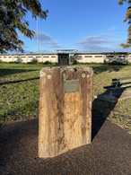 Feighan Park commemoration plaque. The words read: "This plaque was erected in 1989 by the descendants in honour of Charles and Elizabeth Feighan, early pioneers of the area who donated this land in 1936 for recreational purposes."