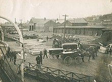 Horse-drawn hearses and caskets on the Halifax wharf