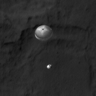 Curiosity descending under its parachute, as viewed by HiRISE (MRO) (August 6, 2012)