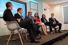 Brown in 2016 (second on the right), taking part in a New America policy roundtable discussion on the implications of a potential election of Donald Trump