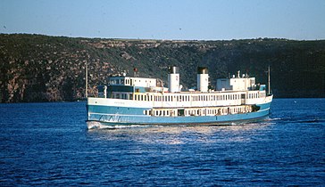 North Head (1913-1985), formerly Barrenjoey, passes Dobroyd Head in her 1970s Public Transport Commission colours.