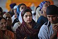 A Sikh women hear speeches from the Prime Minister Najib Razak during a Vaisakhi celebration at Gurdwara Sahib in Kuala Lumpur on April 14th, 2013.