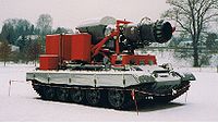 "Hurricane" firefighting vehicle, which uses the engine from a MiG-21 to blow water mist over a fire.
