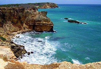 Rocky seashore in Llanos Costa near the Faro Los Morrillos de Cabo Rojo