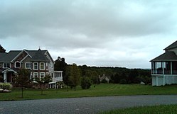 Houses and rolling hills in the township