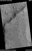 Wide view of deposits in craters, as seen by HiRISE under HiWish program