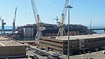 Wreck after being lighten and relocated to the Superbacino dock in Genoa, 28 August 2015