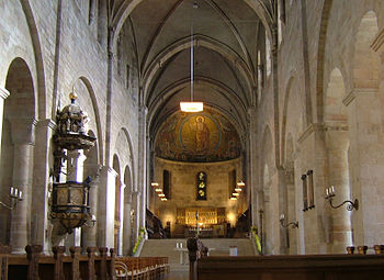 Lund Cathedral, Sweden, has an arcade with paired openings set under a single arch, in a manner common in gallery openings but not usual for nave arcades.