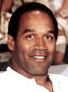 O. J. Simpson headshot in which he's smiling.